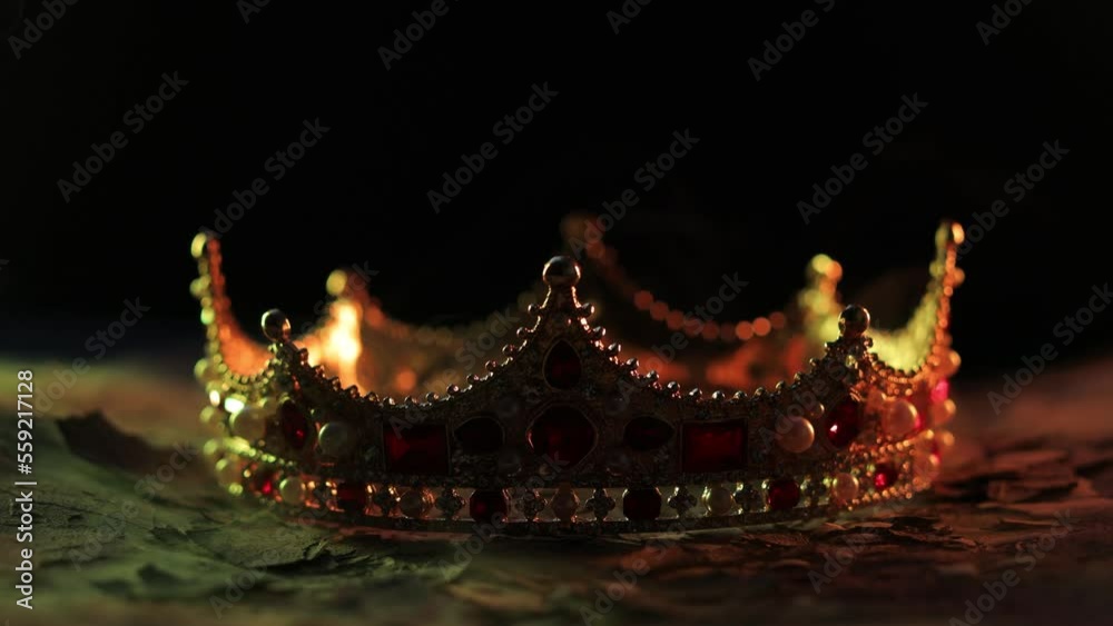Fabulous golden crown of the king on a dark background. Panoramic view of the fog. Mockup for your logo.