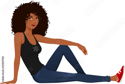 young African American woman in jeans, sitting and smiling