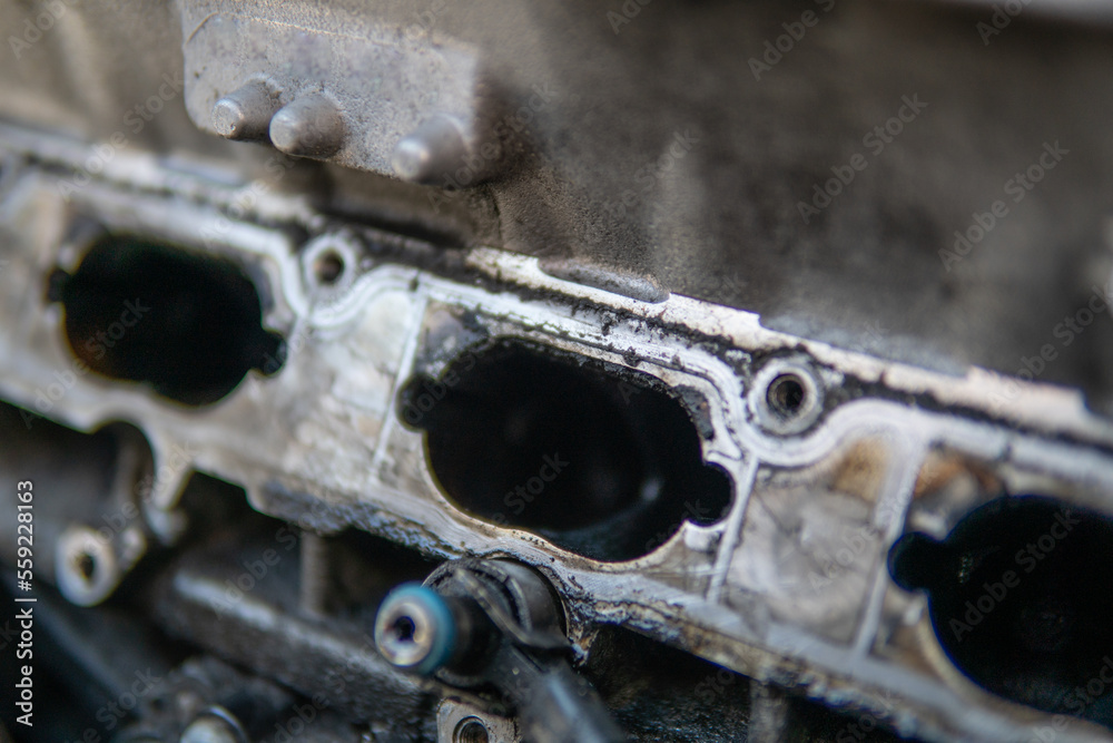 Dirty intake manifold. Close up of dirty intake manifold ports. Engine