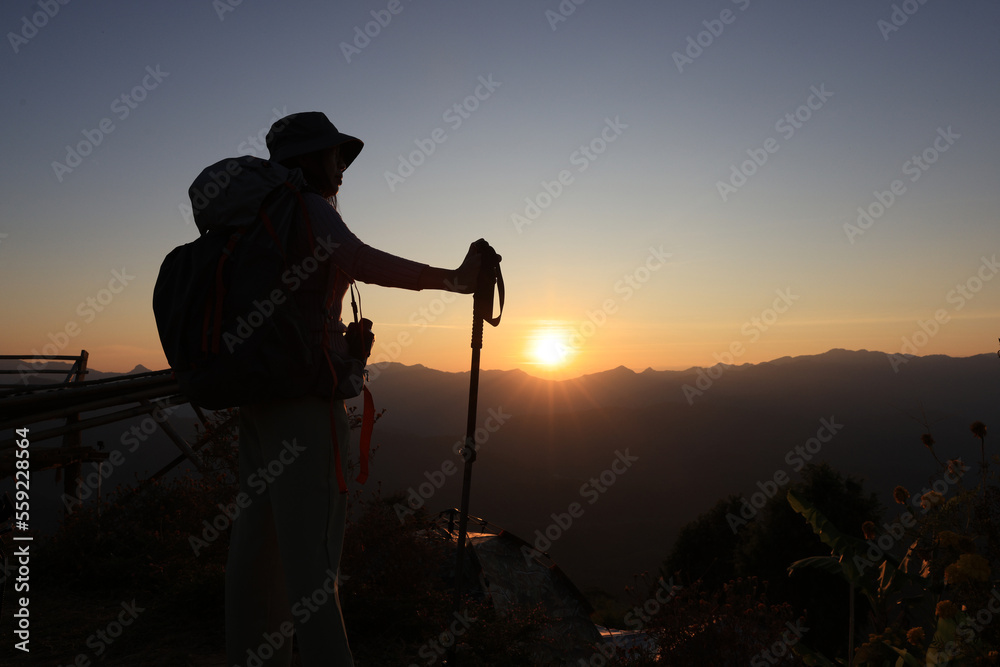 hiker or trekking with achievement emotion on top of Klosero hill , MeaHongSon of Thailand MR 23-002+key