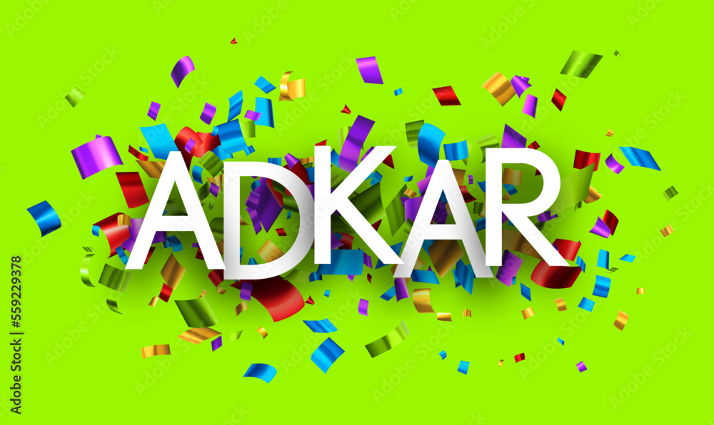 ADKAR sign over colorful cut out foil ribbon confetti background. ADKAR sign over colorful cut out foil ribbon confetti background.