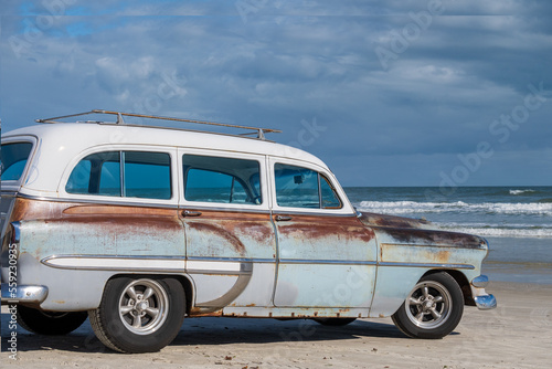 A vintage station wagon on a Florida beach.