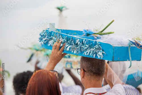 boat with offerings to iemanja, during a party at copacabana beach in Brazil. photo