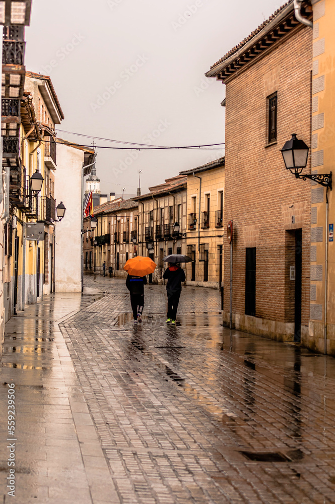 Obraz premium urban landscape with the streets wet from the rain