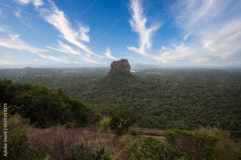 View from Pidurangala mountain to Sigiriya Lion Rock in Sri Lanka. Landscape panorama. After climb up the hill for tourists for wonderful view point to Lion Rock.