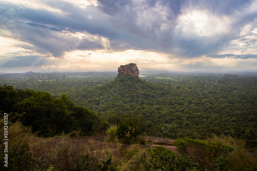 View from Pidurangala mountain to Sigiriya Lion Rock in Sri Lanka. Landscape panorama. After climb up the hill for tourists for wonderful view point to Lion Rock.