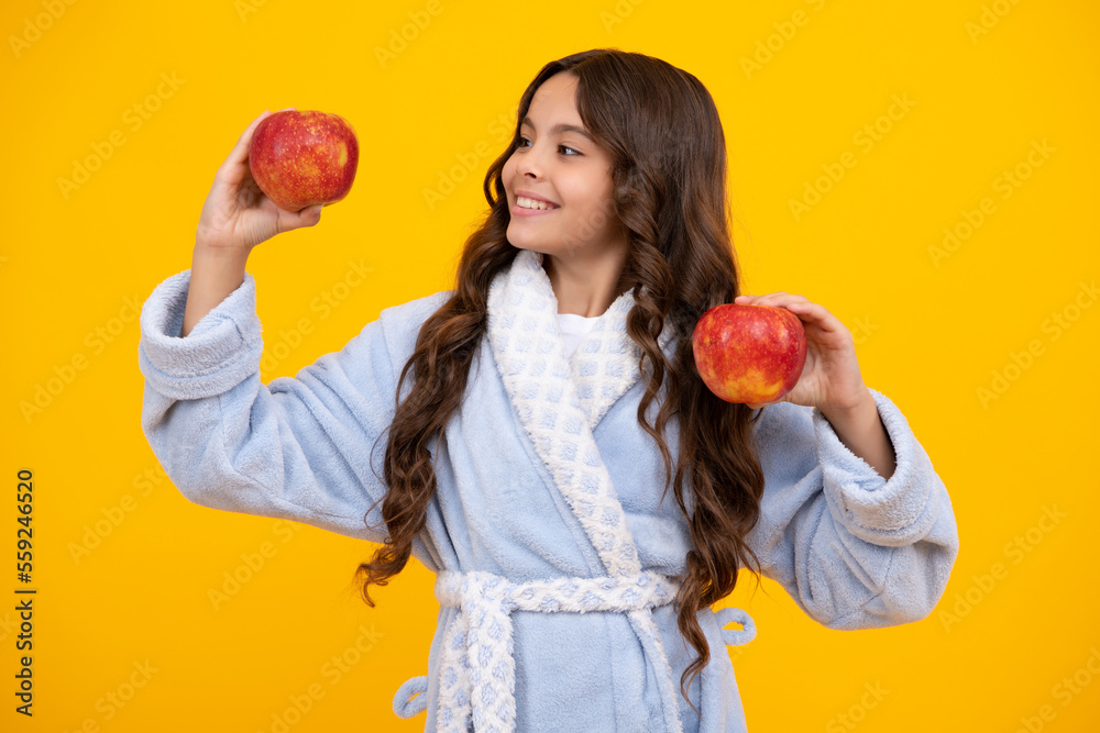 Portrait of confident teen girl with apple going to have healthy snack. Health, nutrition, dieting and kids vitamins. Portrait of confident teen girl with apple going to have healthy snack. Health, nutrition, dieting and kids vitamins.