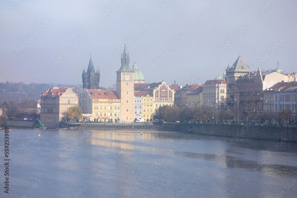 Landscape of Prague and Vltava river at Novoneho lavka in misty autumn morning Landscape of Prague and Vltava river at Novoneho lavka in misty autumn morning
