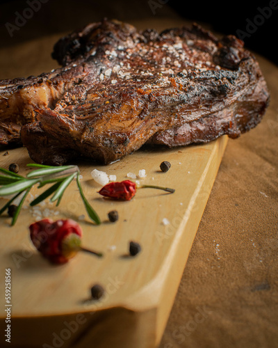 Grilled meat, sliced ​​tomahawk beef steak with spices