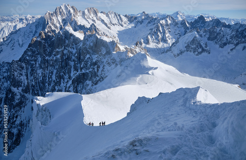 Grand Jorasses and freeriders, extreme ski, Aiguille du Midi, French Alps © Matteo