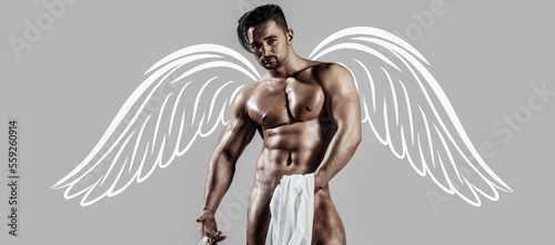Naked muscular angel. Photo banner of sexy man with wings for valentines day. Sexy male model body, nude torso. Sexy naked man, seductive gay. Muscular shirtless man, attractive guy.