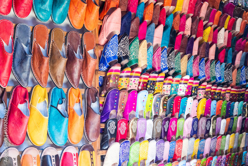 Moroccan slippers displayed for sale in Medina market in Marrakesh © Monica