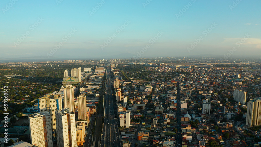 Skyscrapers and business centers in a big city Manila. Modern metropolis in Asia, top view.