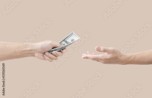 Hand giving and receiving money