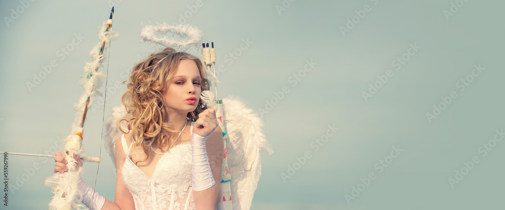 Banner with angel teenager. Child with angelic character. Happy teenage angel girl. Lovely girl cupid with bow and arrow is ready to find your love. Cupid in valentine day Banner with angel teenager. Child with angelic character. Happy teenage angel girl. Lovely girl cupid with bow and arrow is ready to find your love. Cupid in valentine day