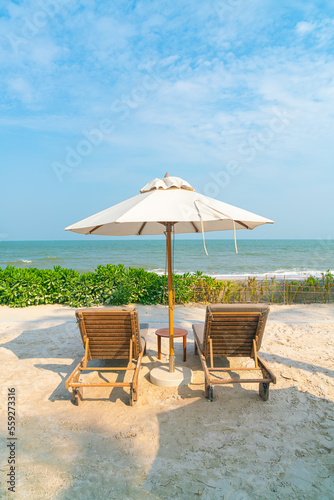 umbrella with beach chair and ocean sea background