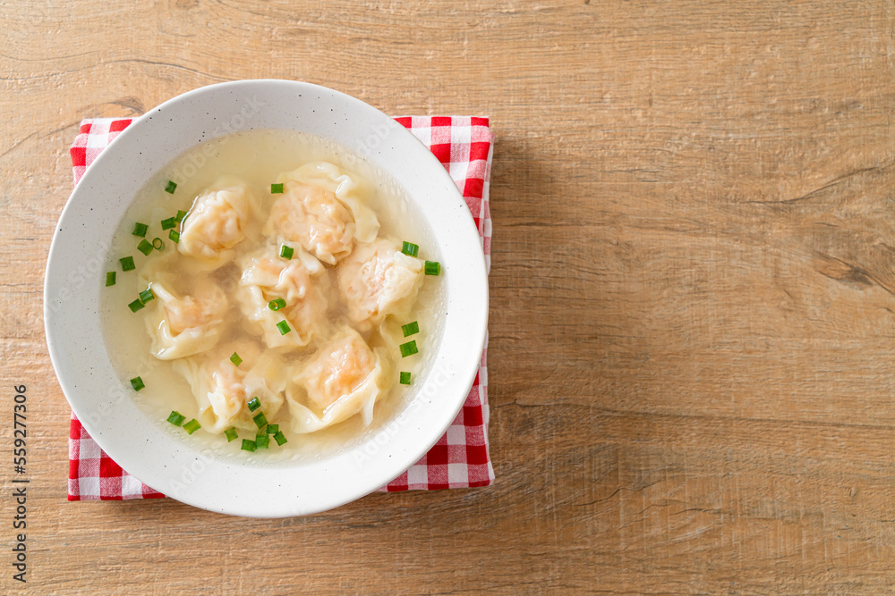 shrimp dumpling soup in white bowl shrimp dumpling soup in white bowl