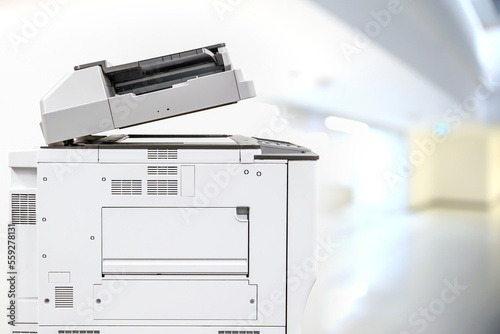 Photocopier printer, The copier or photocopy machine office equipment workplace on white wall background for scanner or scanning document and printing or copy paper duplicate and Xerox.