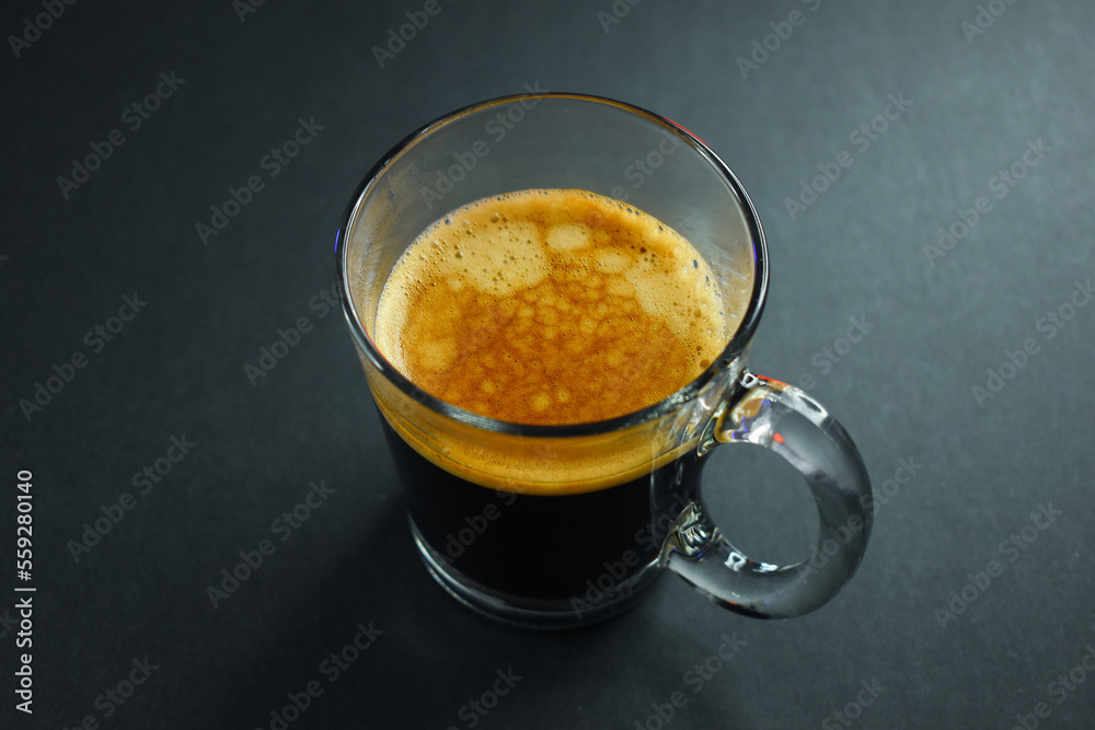 hot black coffee on black table, beverage in the morning hot black coffee on black table, beverage in the morning