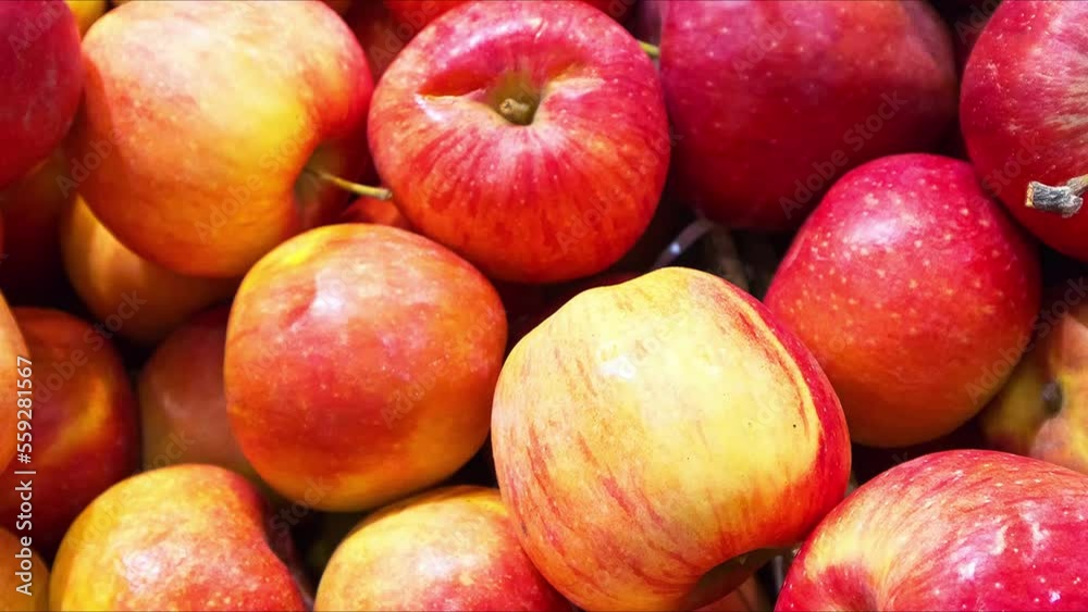 Appetizing fresh red sweet apples. View from above. Organic healthy products. Fruit edible background. Movement with rotation. Top view, closeup, flat lay, mock up Appetizing fresh red sweet apples. View from above. Organic healthy products. Fruit edible background. Movement with rotation. Top view, closeup, flat lay, mock up