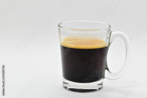 hot black coffee put on white table background