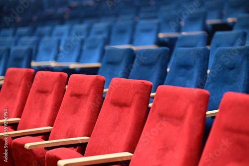 Rows of chairs. Red and Blue Chairs. Empty conсert hall chairs. Cinema hall. Blue and Red soft Chairs. Theater Hall.