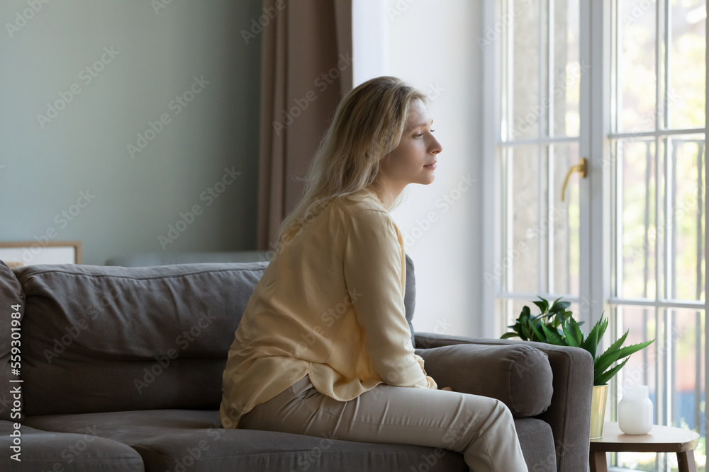 Pensive lonely sad young adult woman thinking on bad new, health problems, suffering from apathy depression, boredom, laziness, feeling tired, bored, depressed Pensive lonely sad young adult woman thinking on bad new, health problems, suffering from apathy depression, boredom, laziness, feeling tired, bored, depressed