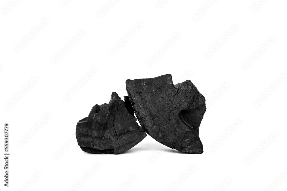 Close up pile of coals or black charcoal stack isolate on white background Close up pile of coals or black charcoal stack isolate on white background
