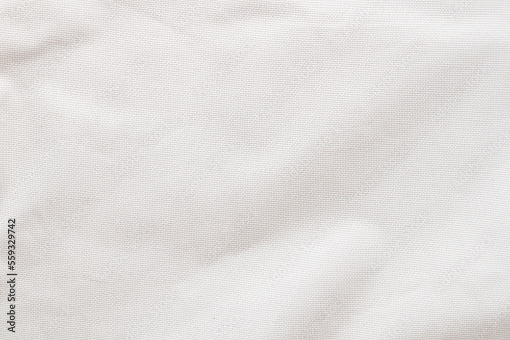 An uneven white canvas with textured details. An uneven white canvas with textured details.