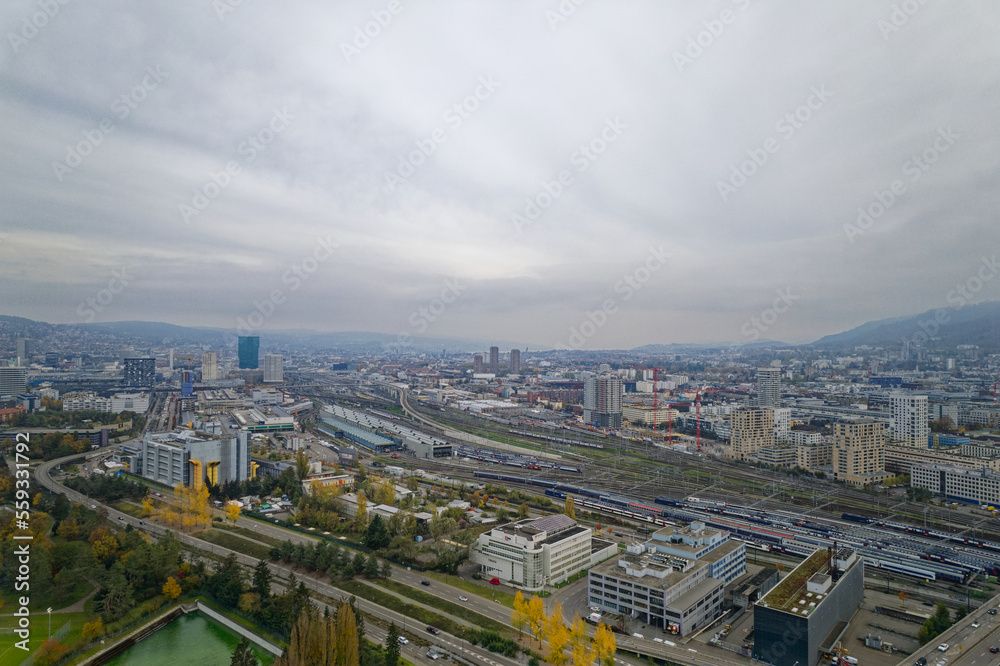 Aerial view of City of Zürich with skyline and panoramic view on a gray and cloudy late afternoon. Photo taken November 12th, 2022, Zurich, Switzerland.