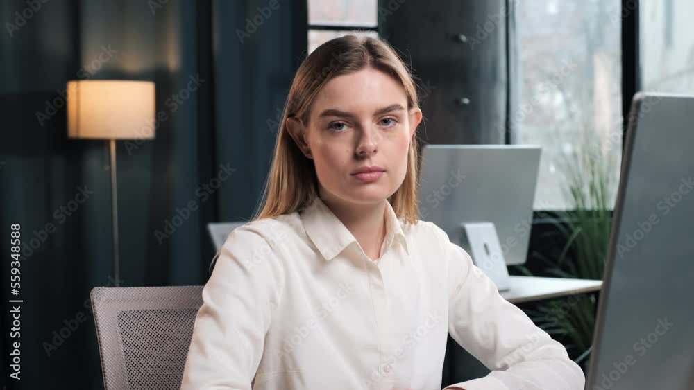 Portrait of serious beautiful businesswoman in formal suit, white shirt looking confident at camera, showing self confidence, business woman feminism worker lady boss female leader posing in office. Portrait of serious beautiful businesswoman in formal suit, white shirt looking confident at camera, showing self confidence, business woman feminism worker lady boss female leader posing in office.