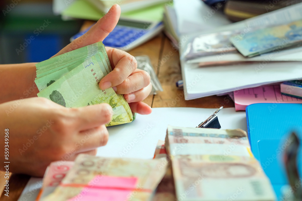 close up image of female hand count the money, business accounting background close up image of female hand count the money, business accounting background