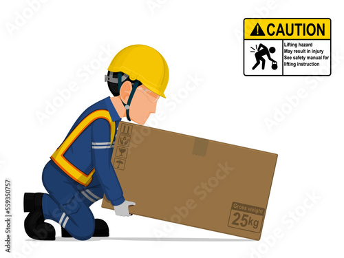 A worker is lifting a big box on the floor