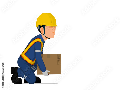 A worker is lifting a small box on the floor