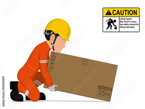 A worker is lifting a big box on the floor
