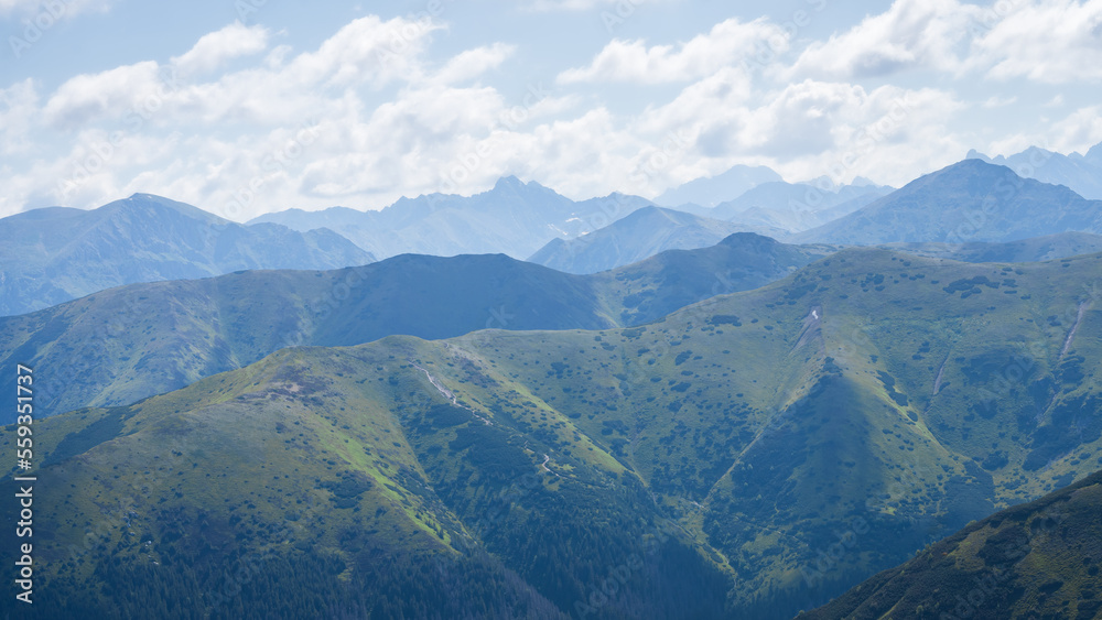 View on green mountain ranges on a sunny day, Slovakia, Europe