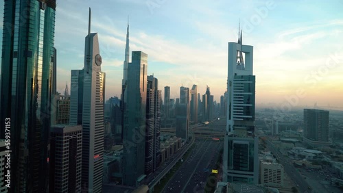 Dubai businessbay panorama. Skyscrappers, citylights, buzzing life and traffic road. High quality 4k footage photo
