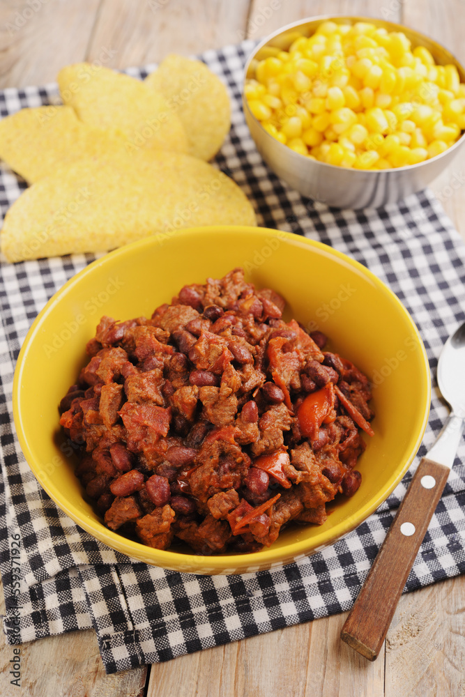 Chili con carne with corn and corn chips Chili con carne with corn and corn chips