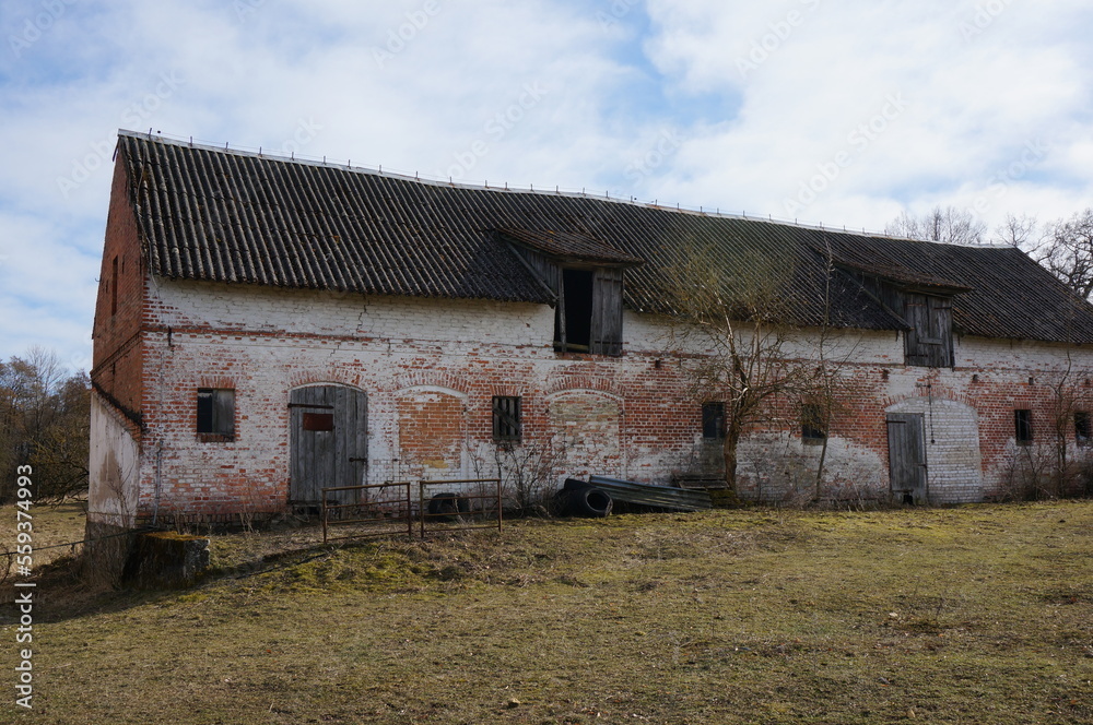 Old big brick barn. Winniki (village in West Pomeranian Voivodeship), Poland.