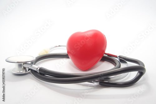 Fonendo and rubber heart isolated on white background. Heart health concept