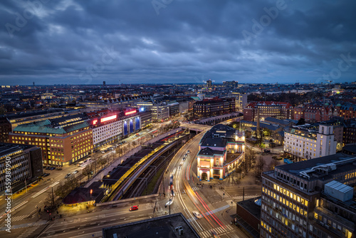 Panoramic view over the skyline of the city center of Copenhagen, Denmark, during dusk time with moody sunset sky
