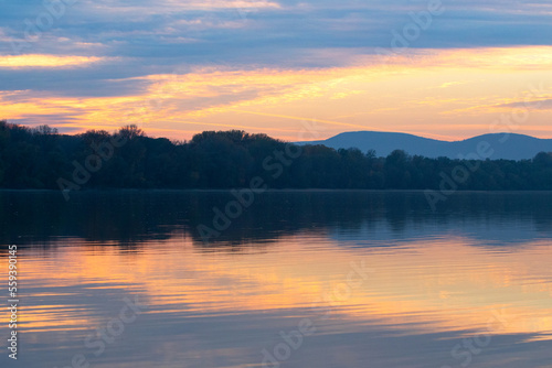 Fototapeta Naklejka Na Ścianę i Meble -  Beautiful landscape, sunsett on the river Danube Hungary with colorful sky reflection