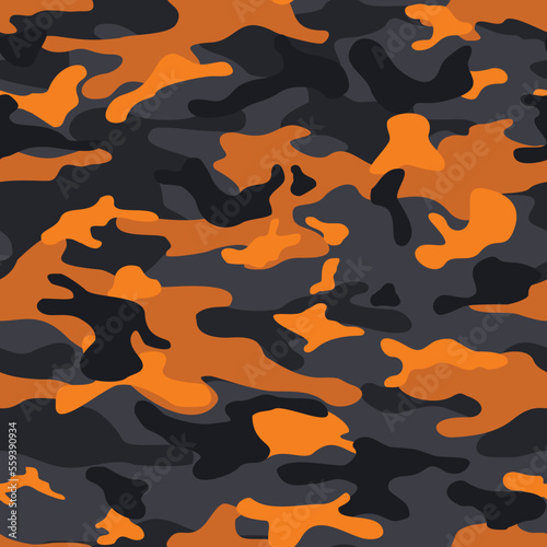 Seamless camouflage pattern of gray and orange spots is modern. Abstract background of spots. Print on fabric and clothing. Vector illustration