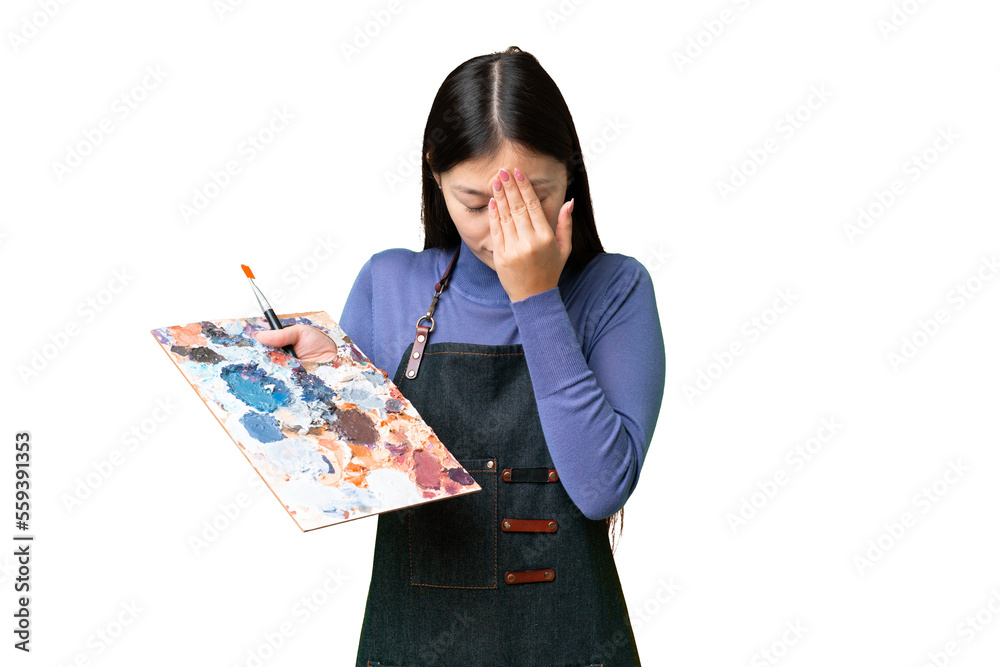 Young artist woman holding a palette over isolated chroma key background with tired and sick expression Young artist woman holding a palette over isolated chroma key background with tired and sick expression