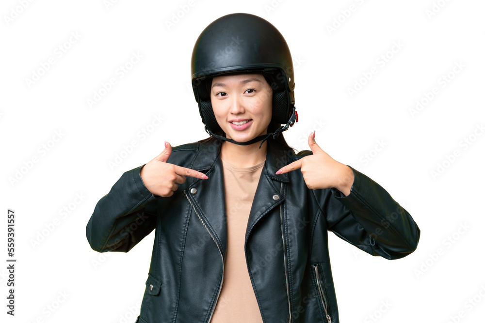 Young Asian woman with a motorcycle helmet over isolated chroma key background proud and self-satisfied Young Asian woman with a motorcycle helmet over isolated chroma key background proud and self-satisfied