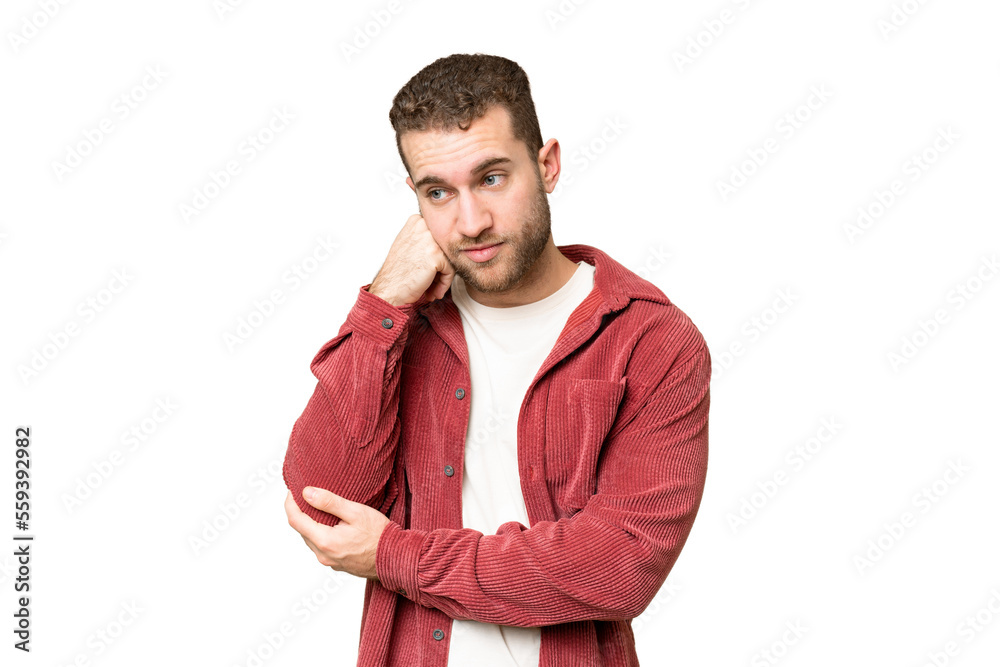 Young handsome blonde man over isolated chroma key background with tired and bored expression Young handsome blonde man over isolated chroma key background with tired and bored expression