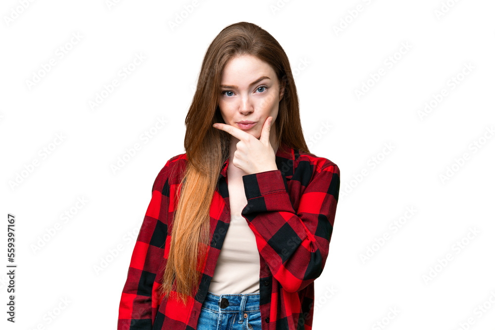 Young pretty woman over isolated chroma key background thinking