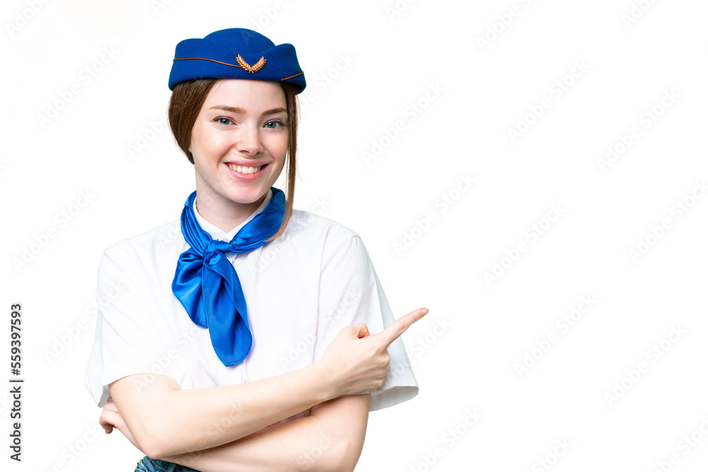 Airplane stewardess over isolated chroma key background pointing finger to the side Airplane stewardess over isolated chroma key background pointing finger to the side
