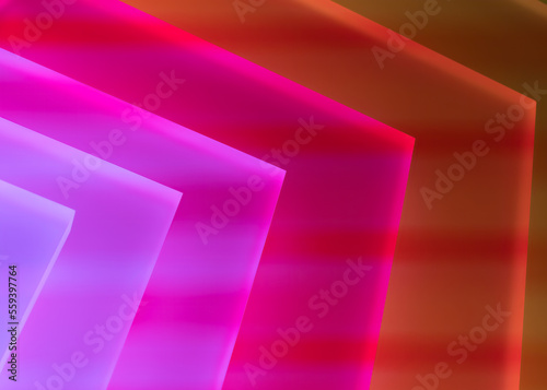 The neon colored light tablets in a dark room