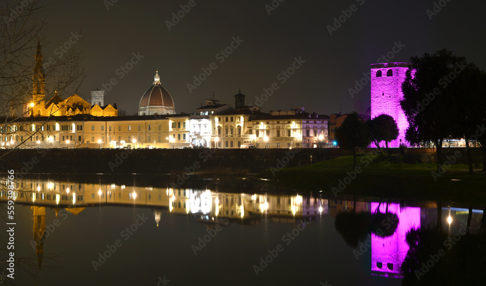 Nightview of Florence reflected on Arno river with Basilica of the Holy Cross, Cathedral and illuminated 